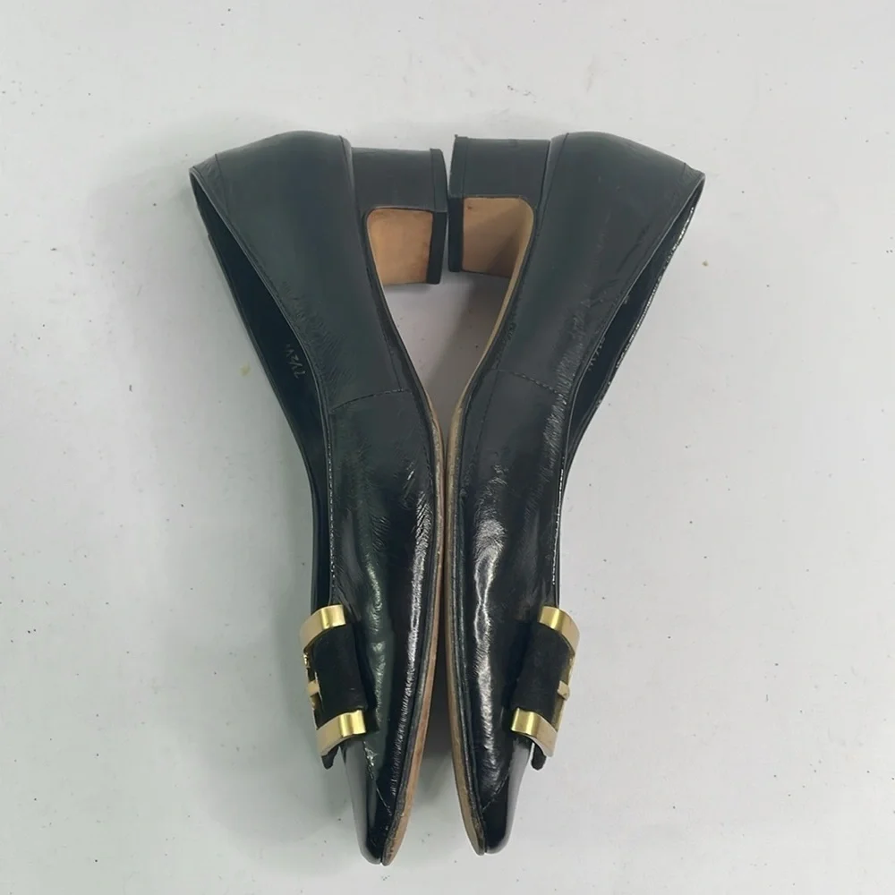 Vaneli black eel skin? Pumps w rounded square toe. Suede and gold buckle detail.